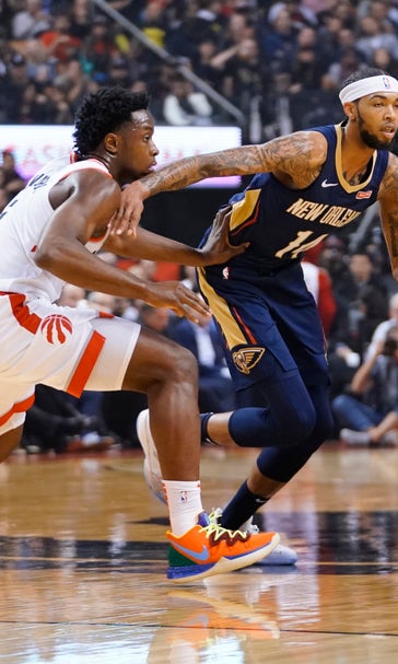 Pelicans take defending champion Raptors to overtime on Opening Night